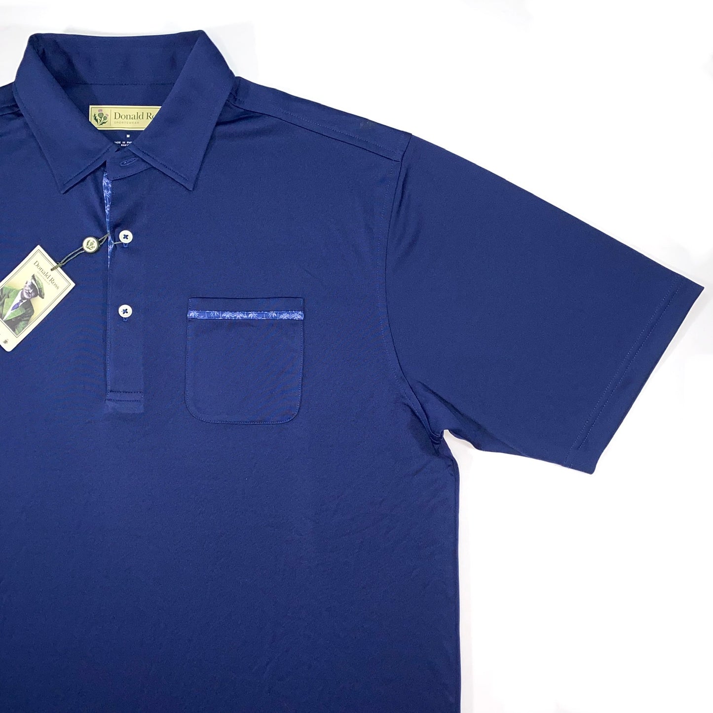 Donald Ross Men’s Solid Fancy Placket Golf Polo Shirt, open view of left side with pocket on chest
