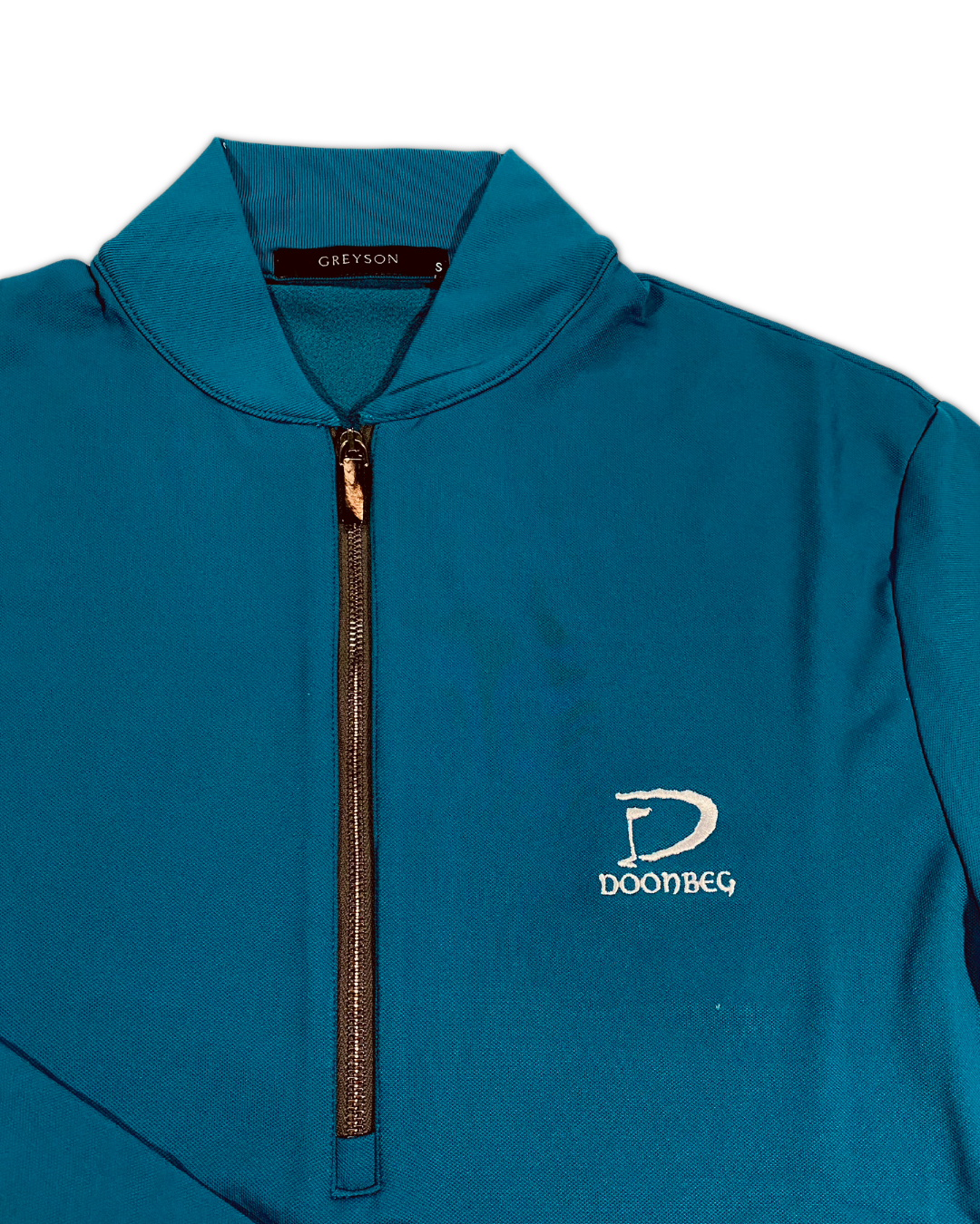 Greyson Men’s Siasconset Quarter-Zip Golf pullover (Trump Doonbeg logo) close up of closure and embroidered