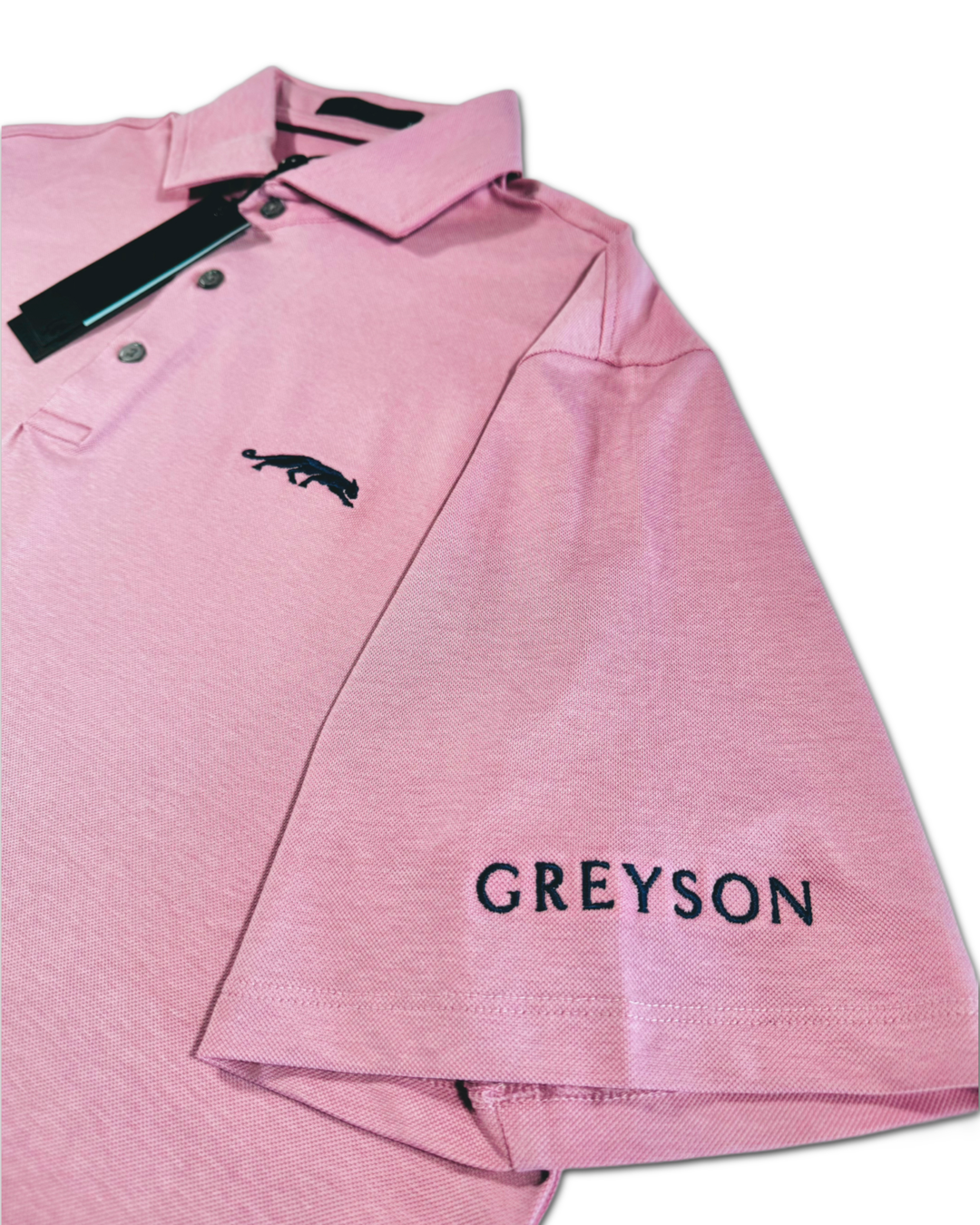 Greyson Men’s Michael Jordan THE GROVE XXIII Golf Polo Shirt, close up of embroidered brand name on sleeve 