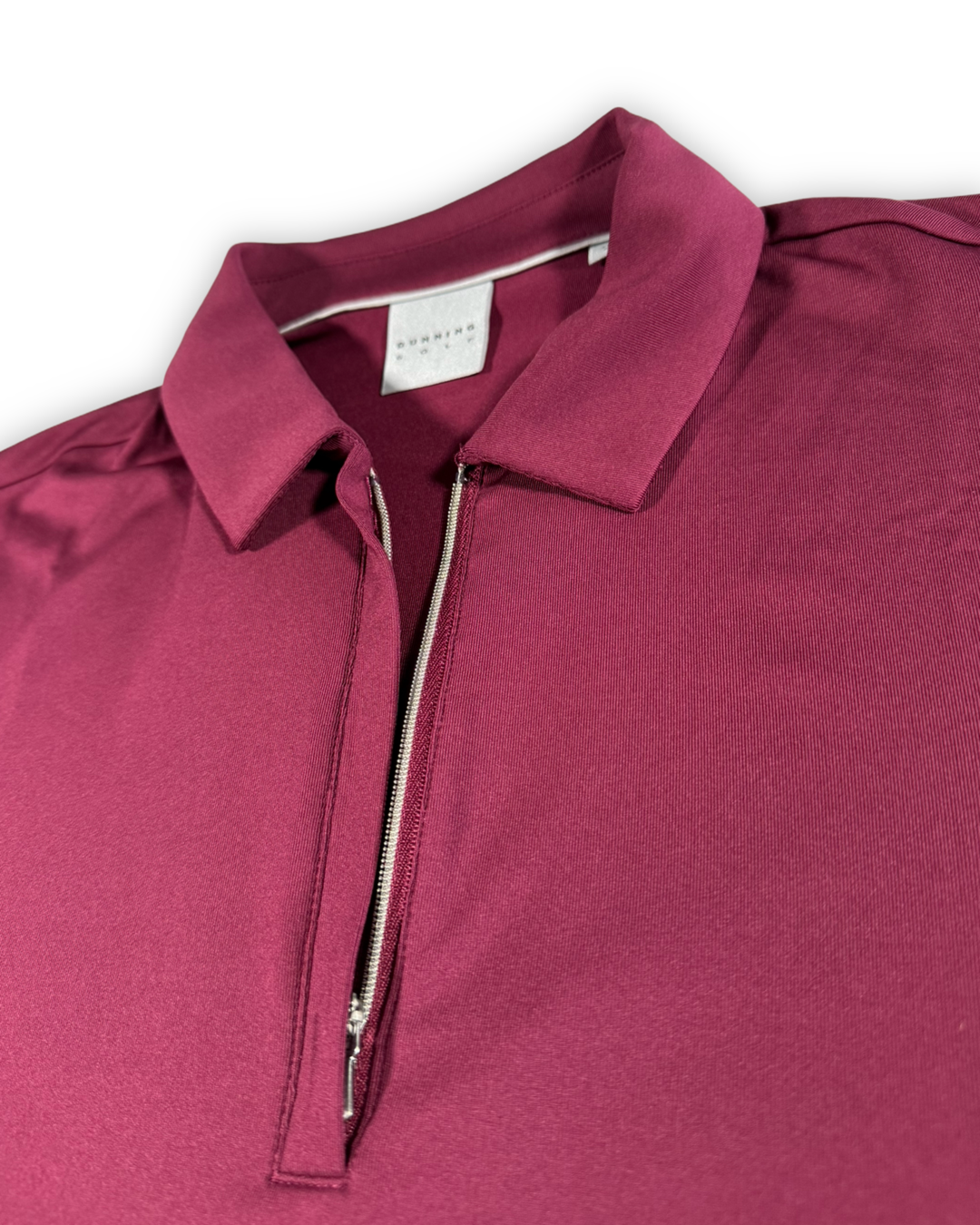 Dunning Golf Women’s Long Sleeve Polo Quarter zip , close up of zip closure open 