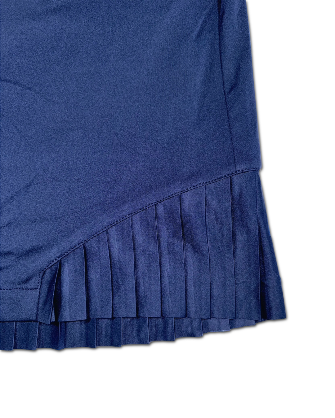 Greg Norman Women’s Pleated Golf Skort, close up of front side pleated details 