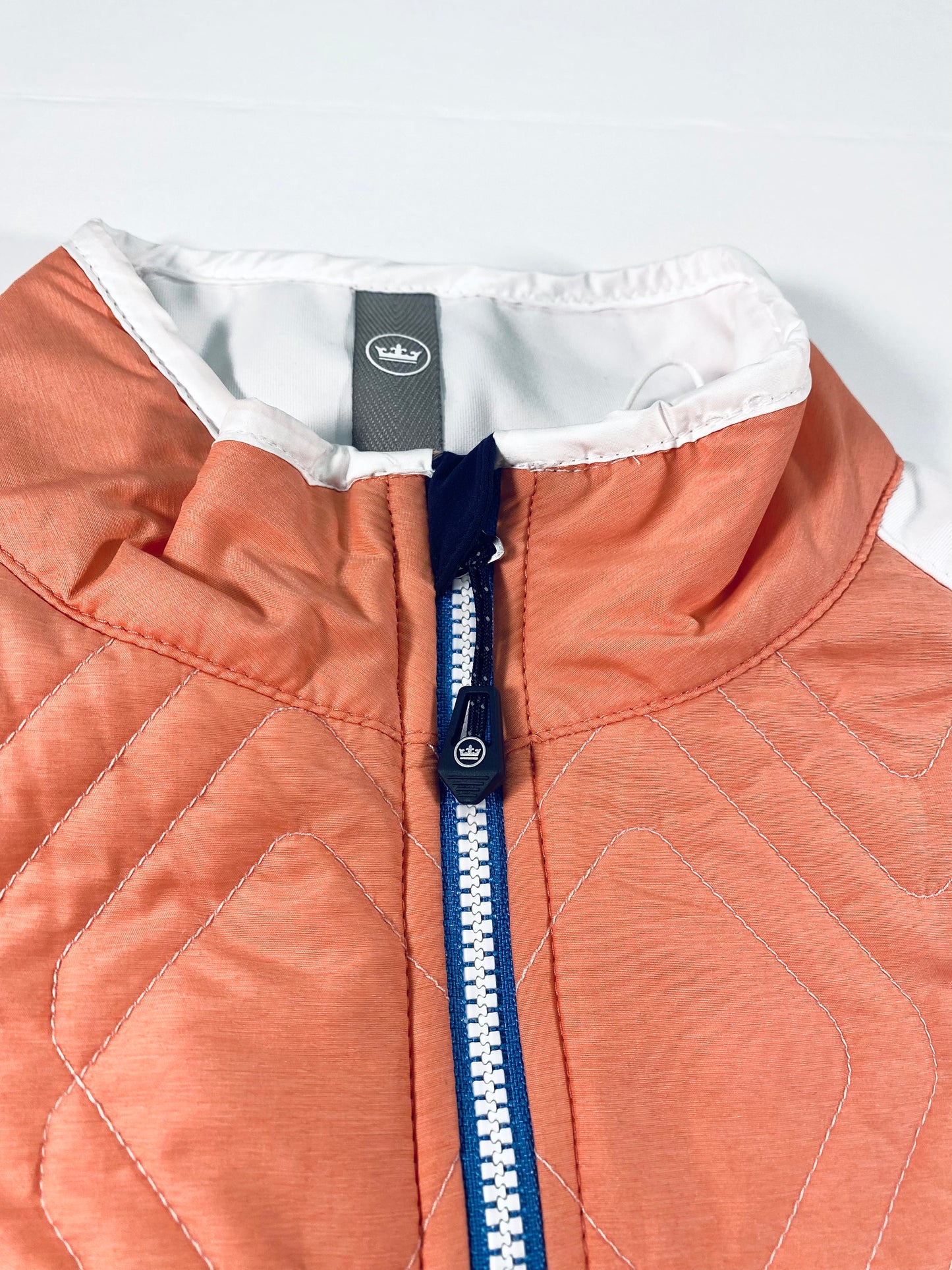 Peter Millar Women's Lizzie Hybrid Quilted Full-Zip Golf Vests  Mock neck with logo and zipper with two way opening