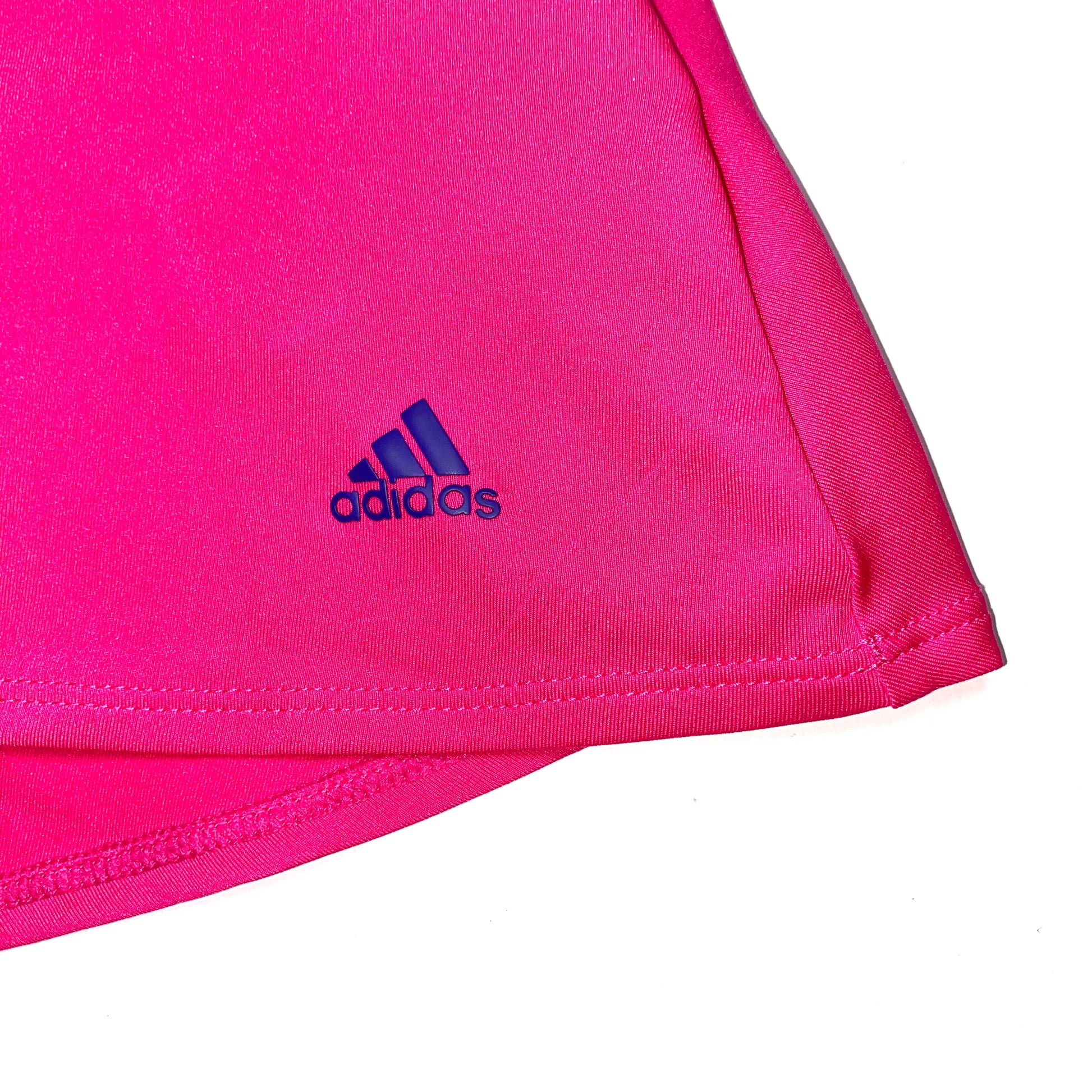 Adidas Girls Ruffled Golf Dress brand logo at the bottom side 